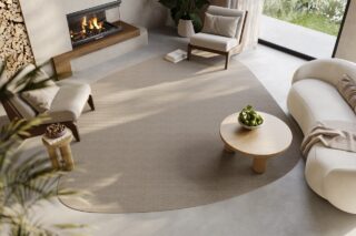 organic shaped synthetic sisal rug in living room