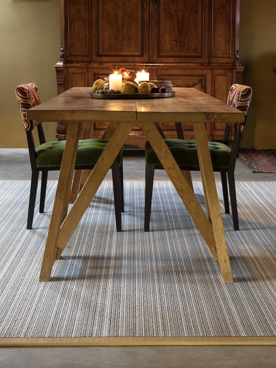 dining room with fall decor and wool rug