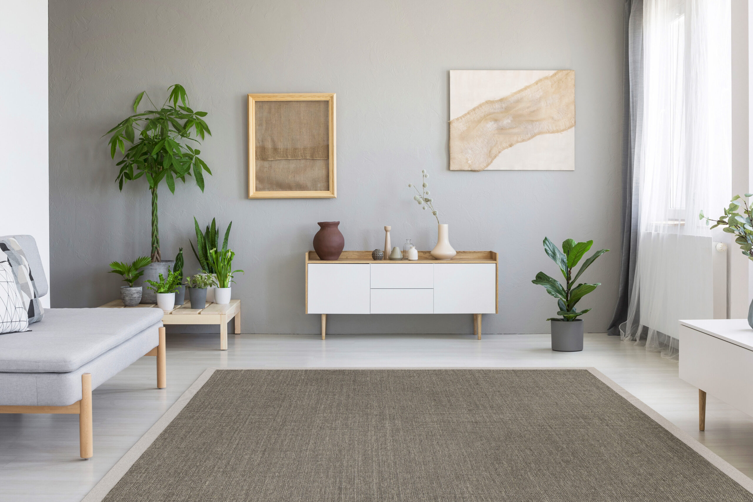 EarthSISAL™ area rug in color birch in minimalist living room.